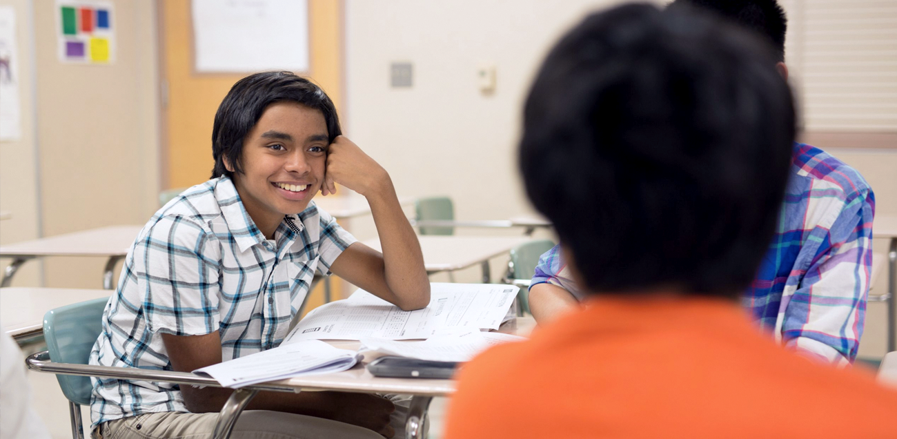 Student receiving personalized feedback in a San Diego Essay Bridge course to strengthen writing clarity and style